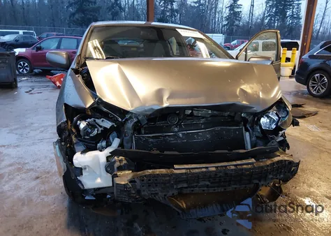 2011 Honda Insight from USA, damaged, VIN JHMZE2H32BS001076